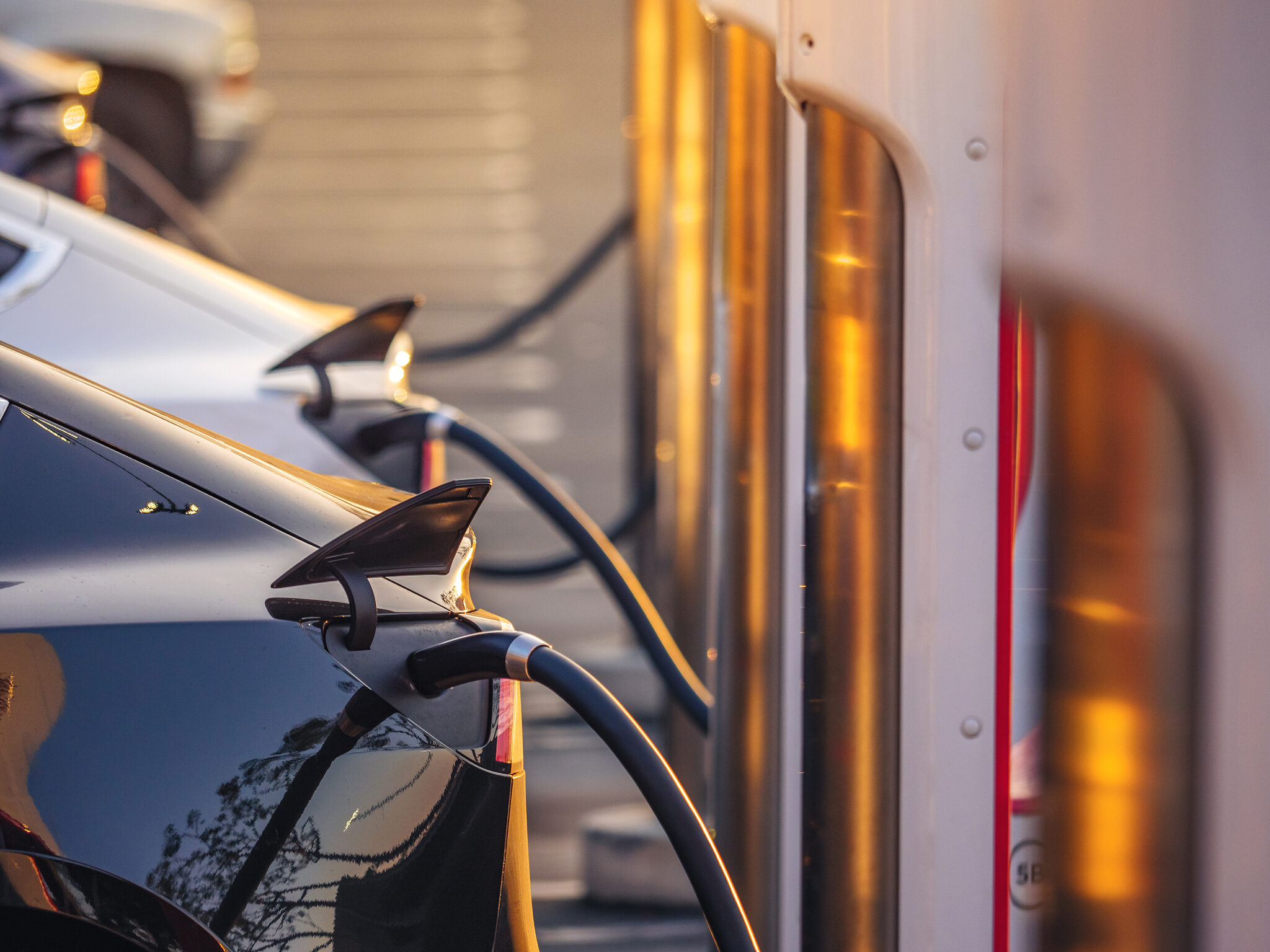 EV charging at a fleet depot at dusk